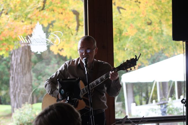 Dave Milliken singing at the wedding of Danielle Bisson